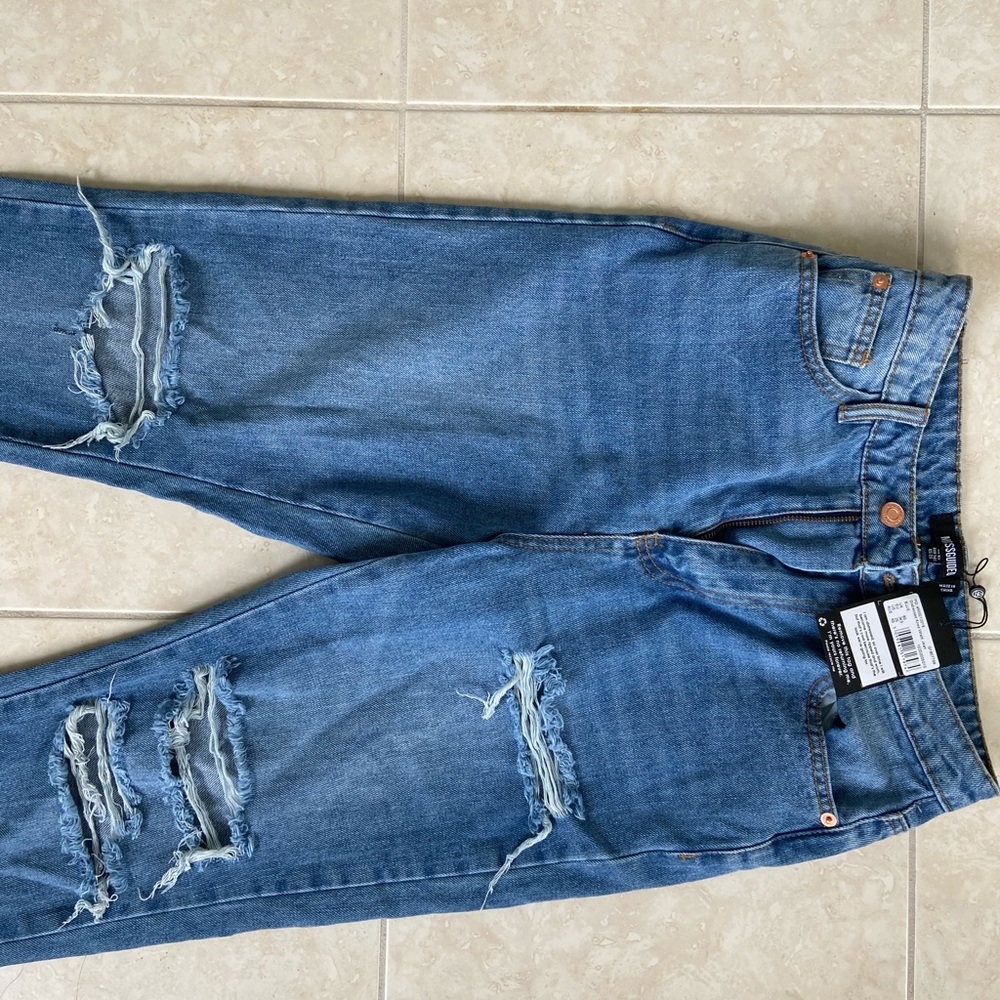 Blue distressed knee wrath mom jeans